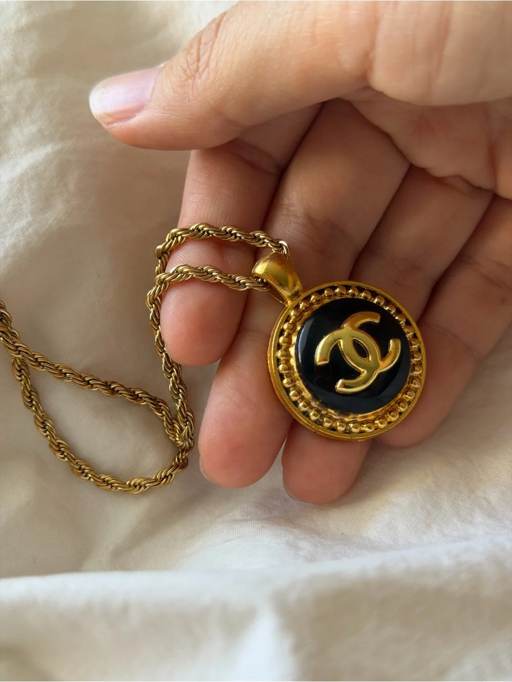 CHANEL Gold and Black Round CC Medallion Necklace
